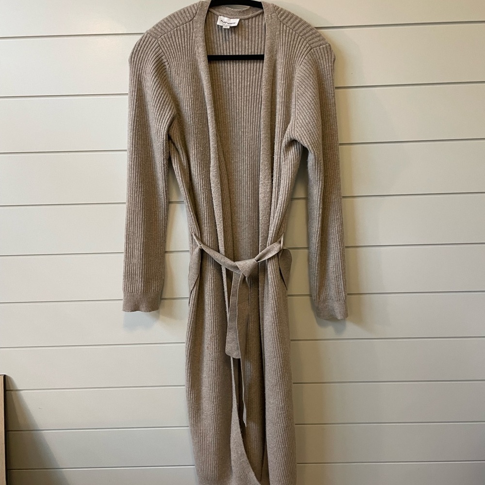 Long sleeved cardigan with optional tie belt. Roll cuffs up, jeans & white tee